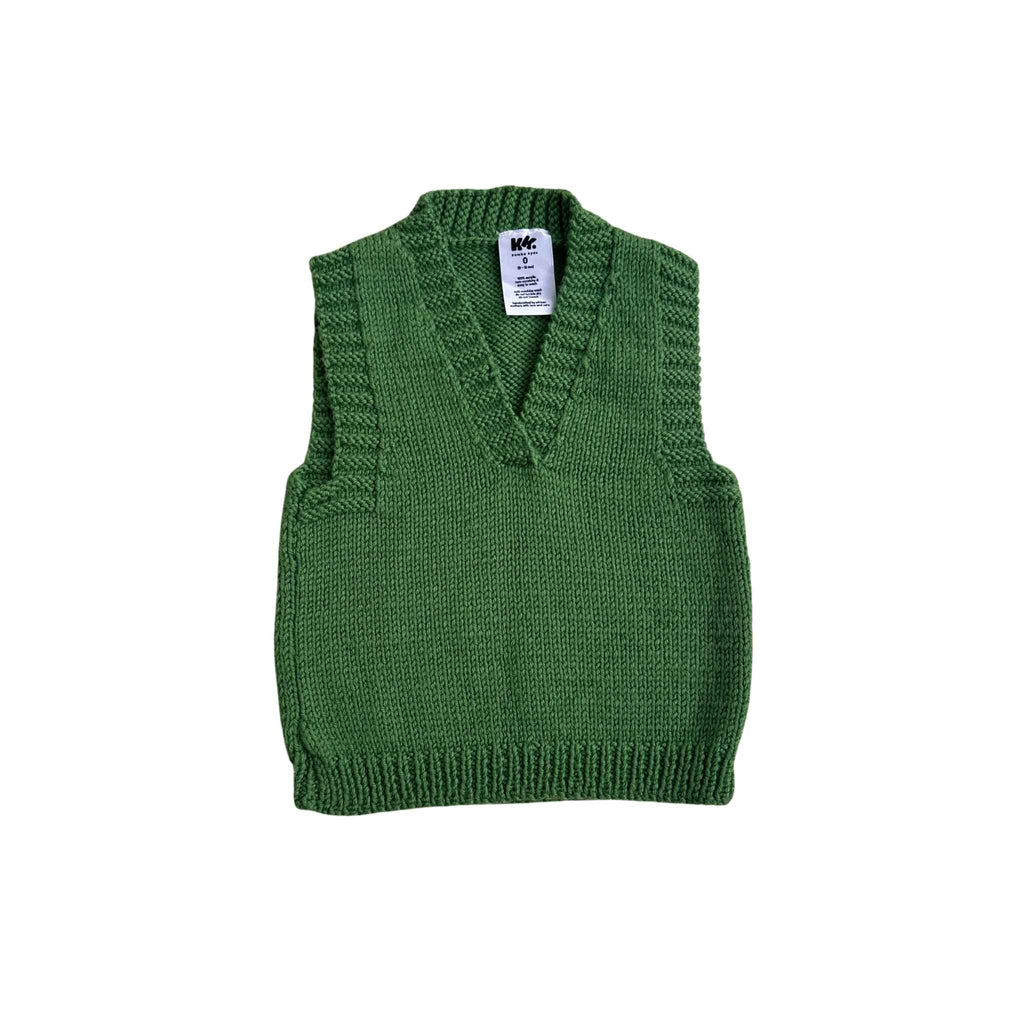 Green knitted vest with a brand label on a white background