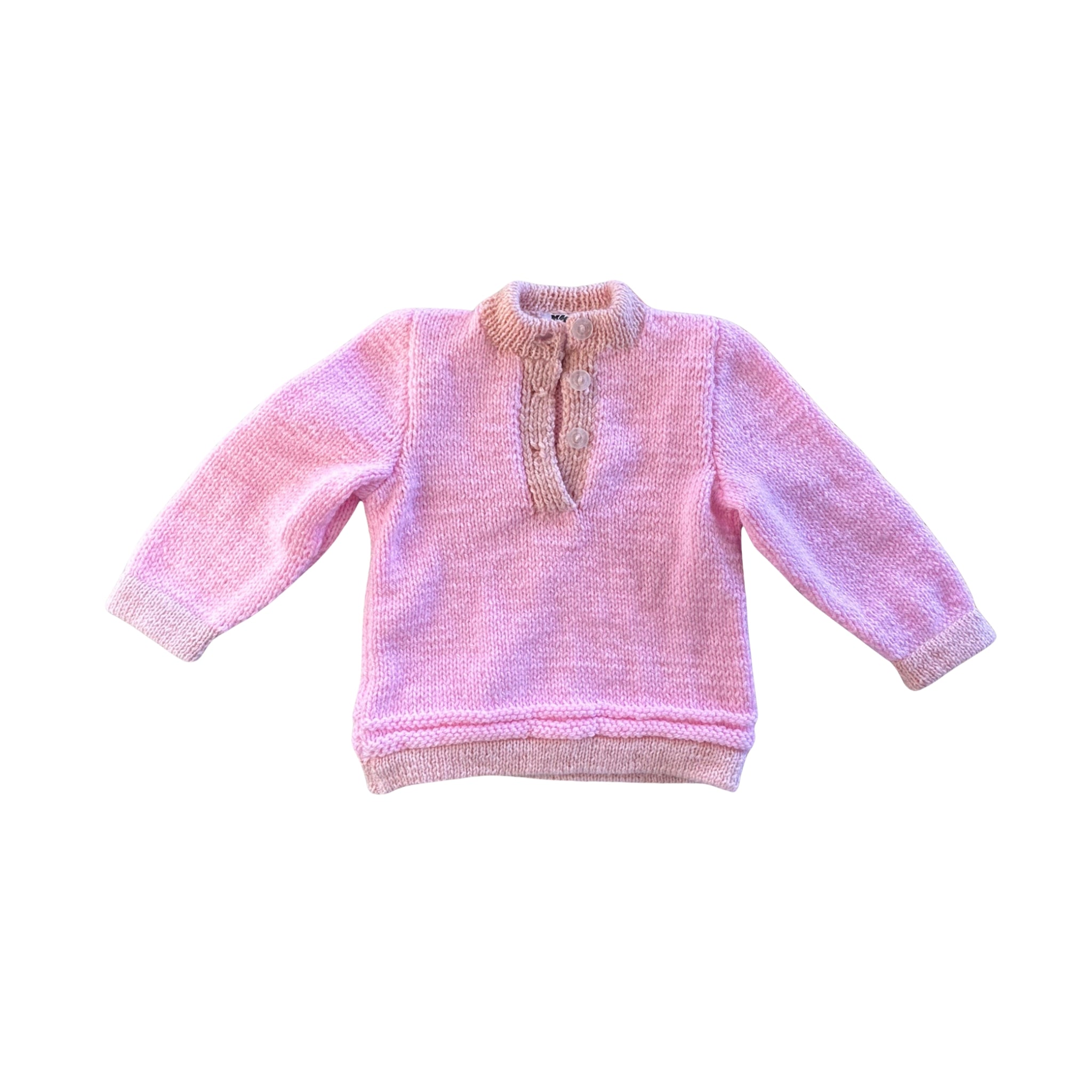 Pink knitted sweater on a white background